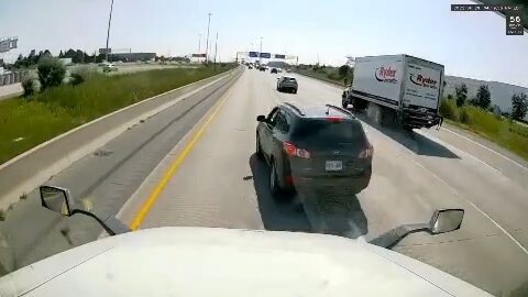 Reckless Driver Brakes In Front Of Transport Truck