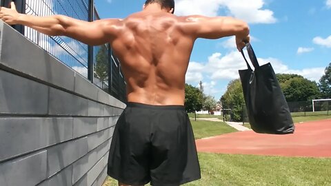 50 Pounds Sandbag Lateral Raise, 45 pounds weight vest pushups, and more