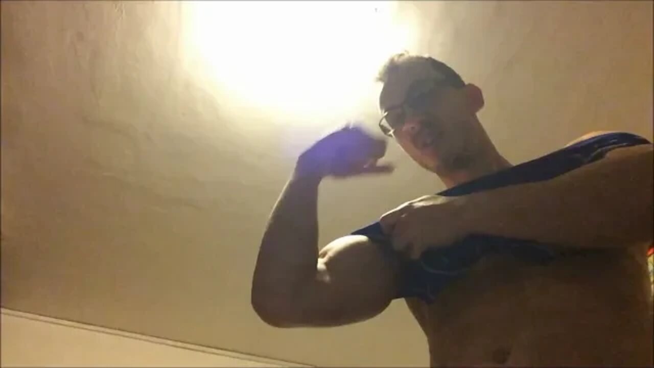 Cocky boy flexing HUGE ARMS