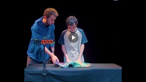 Solving Rubik’s Cubes, while juggling them.