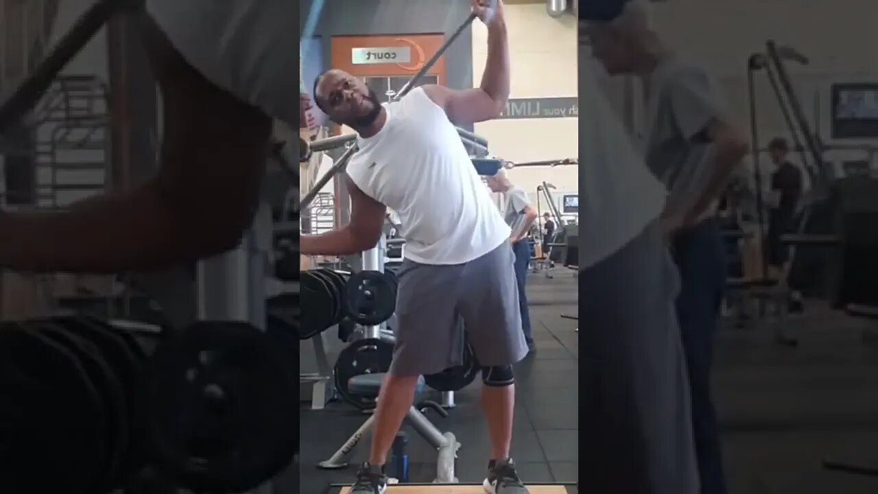 Lateral stretch with Olympic Bar