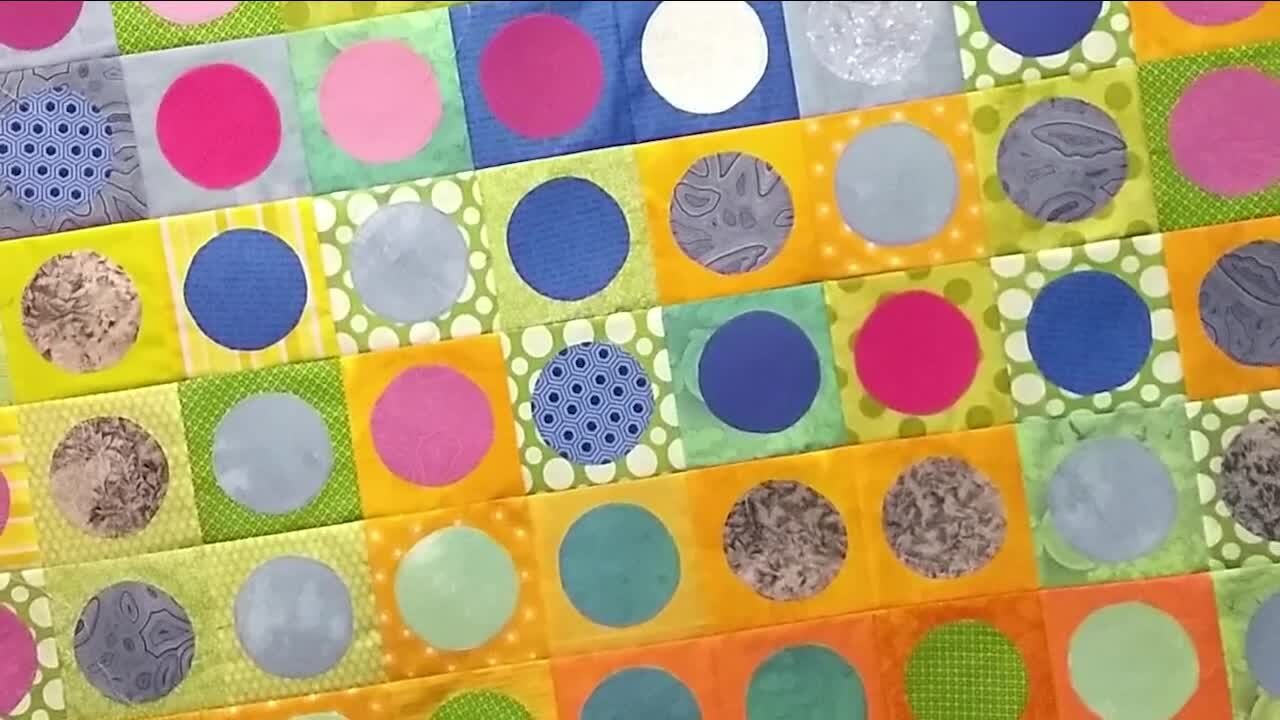 Greeley couple constructing quilt to represent Colorado's temperatures every day