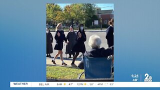 Crossing guard's warm welcome back