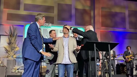 Pastors praying over Tyler at SoCal CM 22