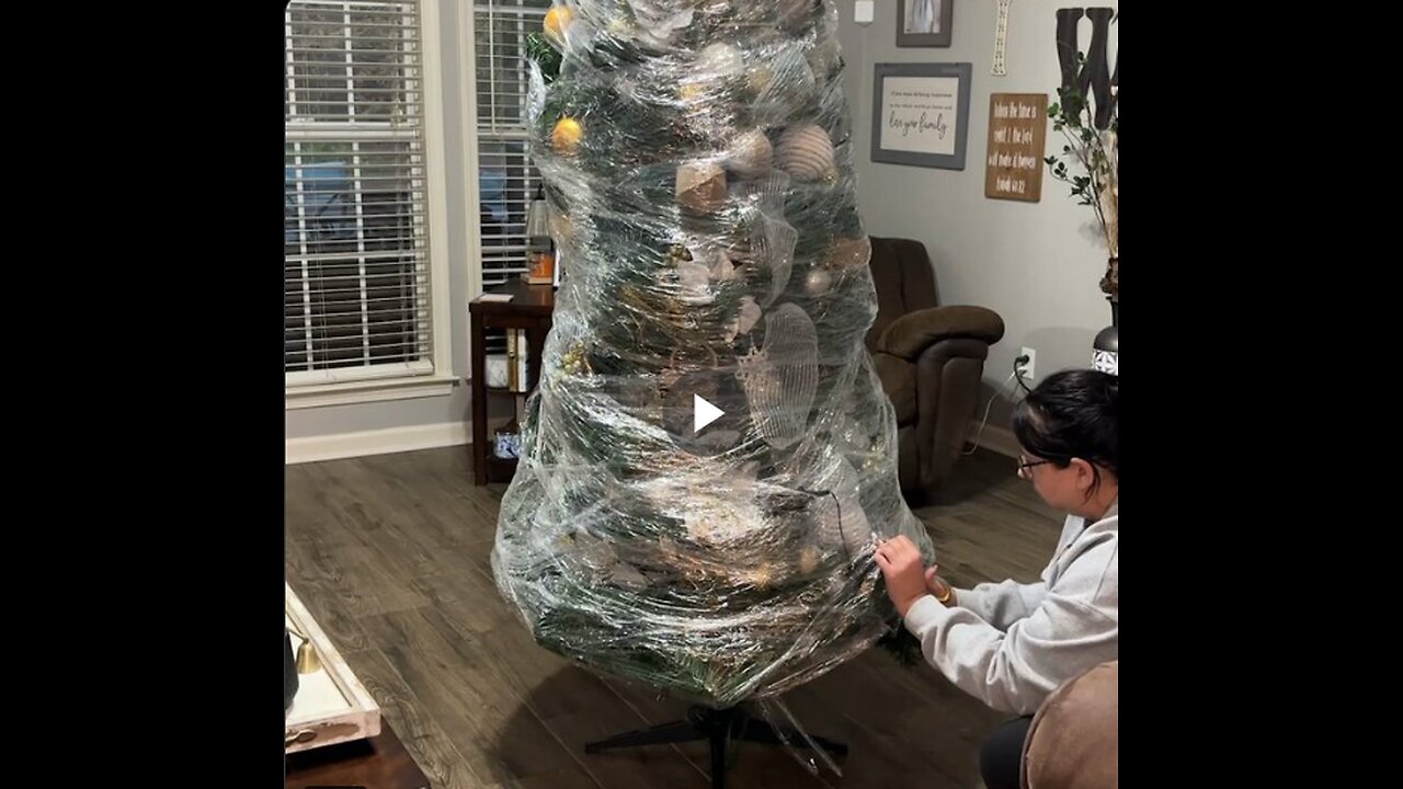 She unwraps fully decorated tree from last year to save herself time and energy this Christmas.