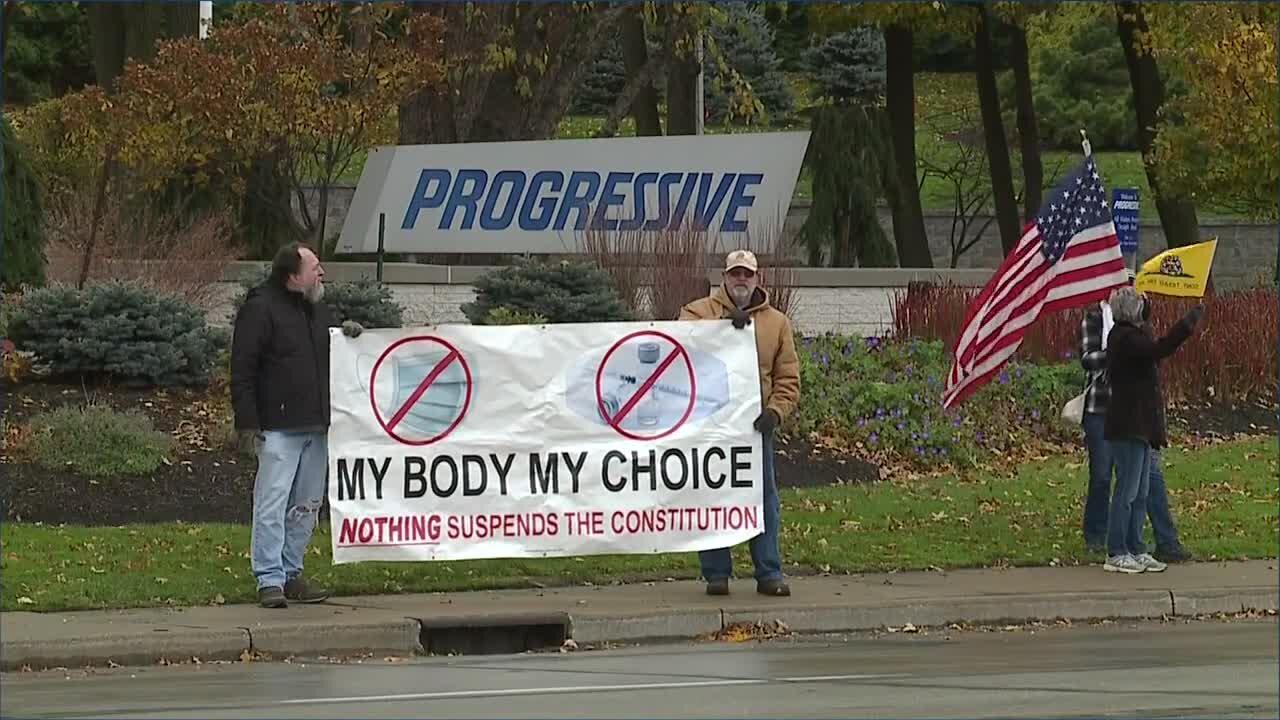 Demonstrators gather outside of Progressive in Mayfield to protest vaccine policies