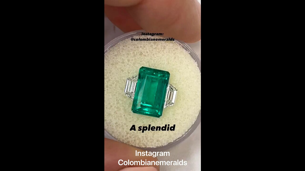 A classic elongated rectangle cut 4.46ct bluish vivid green AAA grade Colombian emerald crystal gem