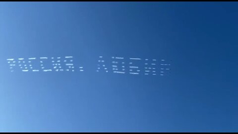 "Russia, we love you" in skywriting over Moscow on the eve of June 12, Russia Day, a national holiday