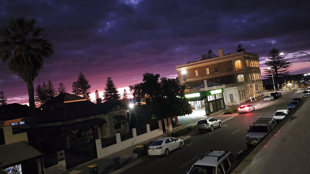 Sunset over the largs pier hotel