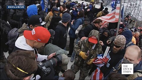 J6 1:07 - 1:10 PM Crowd Helps Josh Black on the West Plaza after First Shots.