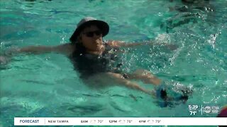 St. Pete Beach residents jump in the pool for Worldwide Aquathon Day