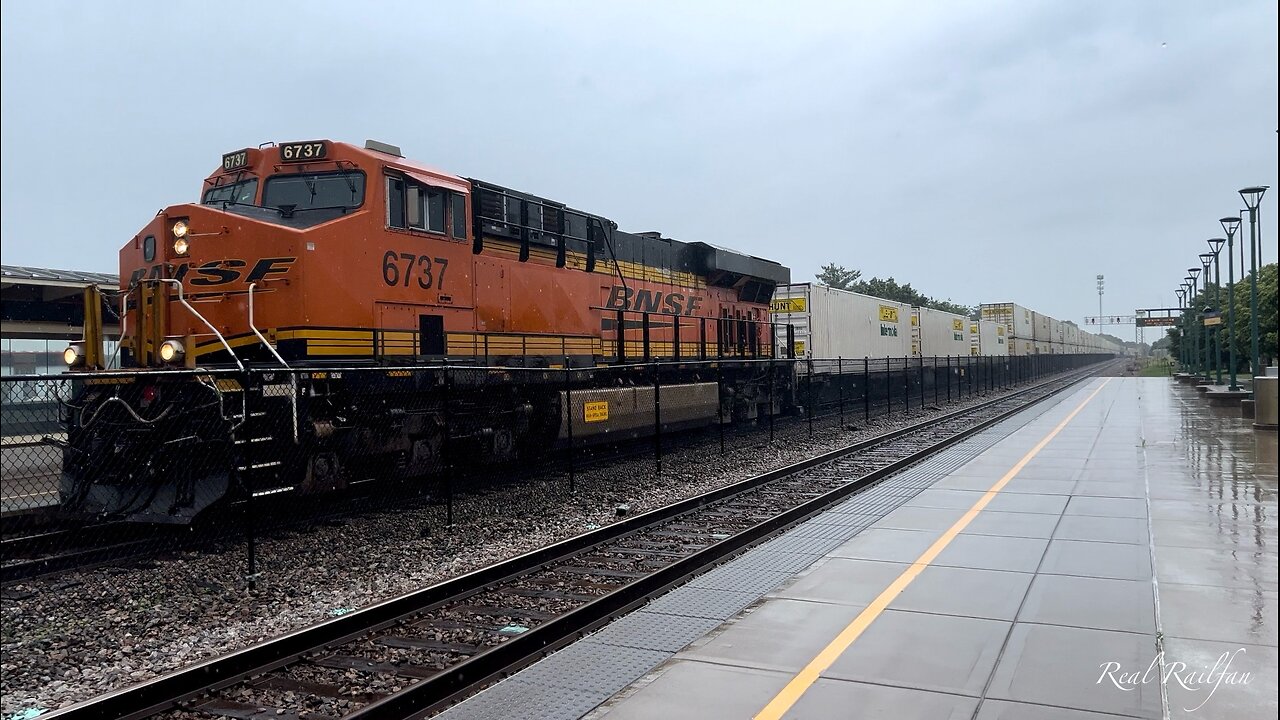 Dedicated Train Fan Recording Video in the Rain - Staples Subdivision