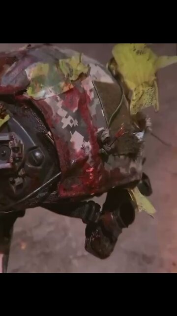 🔞 Ukrainian helmet after a head shot…