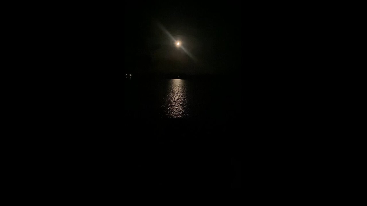 Moon shining on the water outside my kitchen window