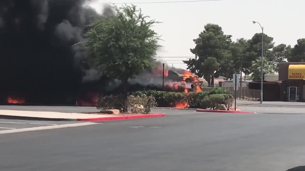 Bus on fire at Charleston and Pecos on Sunday