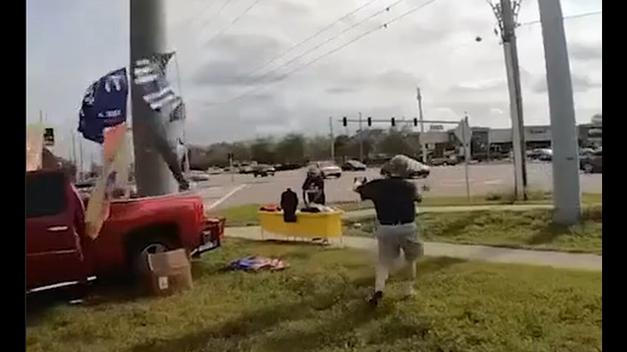 Biden Voter Tries To Stop Street Vendor From Selling Trump Gear