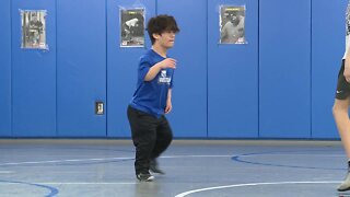 Olathe West wrestler uses size to his advantage, will compete at state championship meet