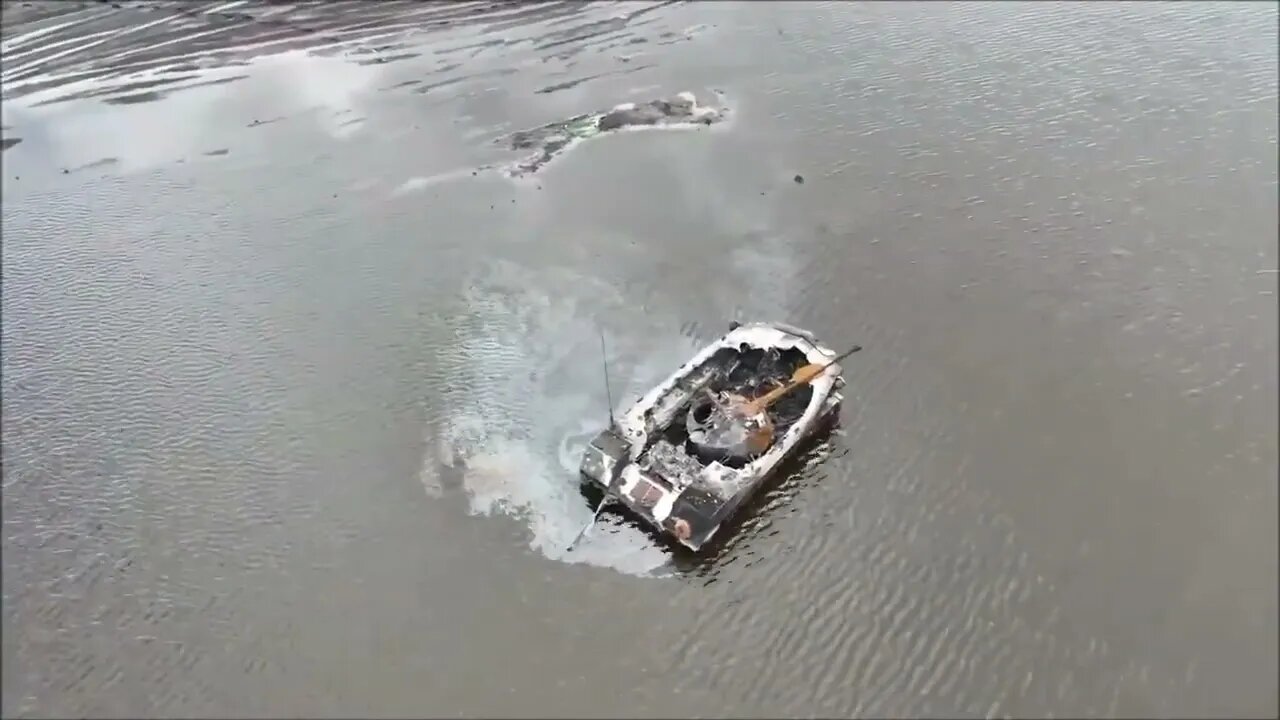 DRONE FOOTAGE OF DESTROYED/ABANDONED RUSSIAN MILITARY HARDWARE IN THE FLOODED-AREA NEAR MOSHCHUN!(2)