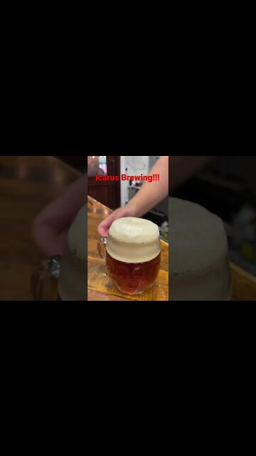 Blow the froth off a cold one