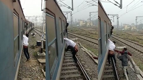 Thief Hangs from Moving Train Window after Failed Robbery Attempt