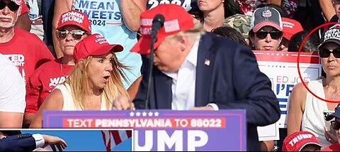 Woman sitting behind Trump during assassination attempt goes viral for her very strange behavior