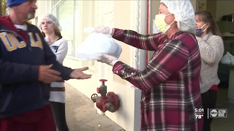 Metropolitan Ministries volunteers hand out hot meals on Thanksgiving