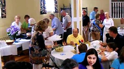 A quick pan of the crowd during the feast.AVI