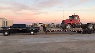 Ram Megacab Dually Hauling Mack Truck