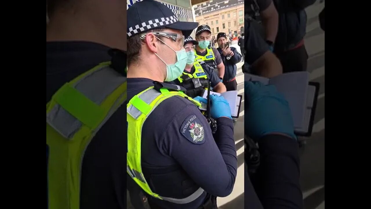 Police arresting and processing protestors at Flinders Street, Melbourne