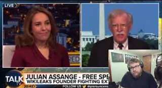 Julian Assange's wife Calls John Bolton a “War Criminal" to his Face