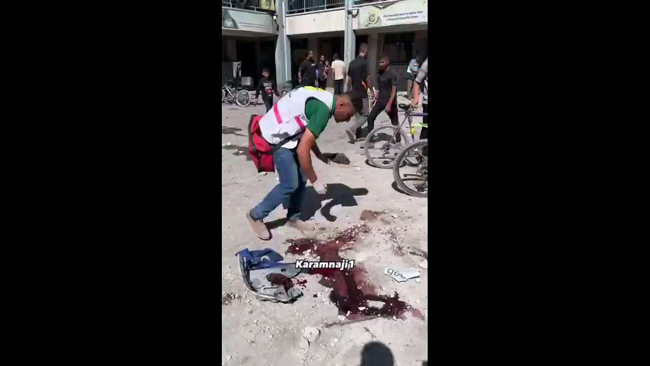 Palestinians pick up the scattered & blasted remains of children murdered by the israelis during the