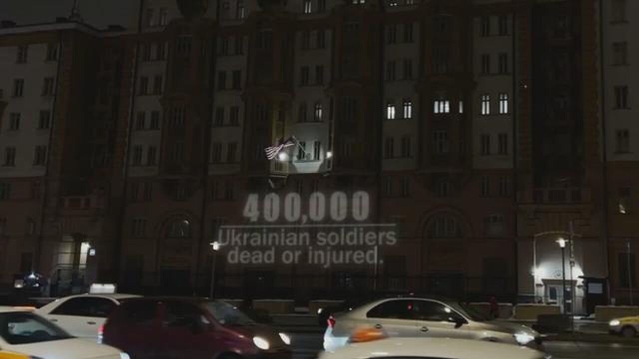 Image Projected Onto US Embassy In Moscow: "400k Ukrainians Dead, Want To Carry On?"