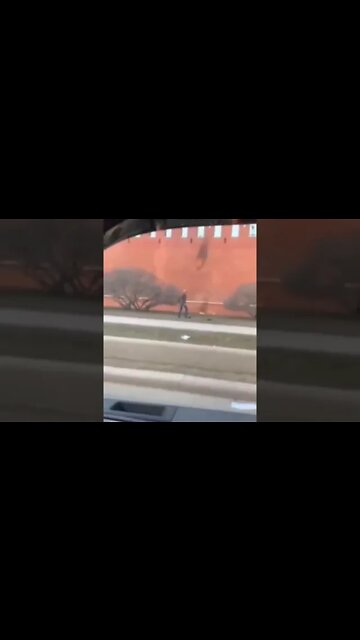 Man in Moscow throws a Molotov cocktail at the Kremlin wall. #russia