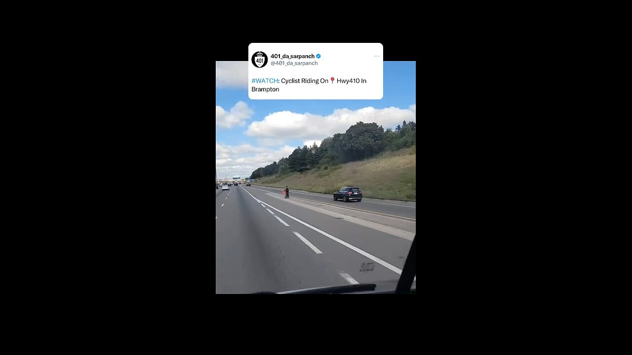 Cyclist Riding On Hwy 410