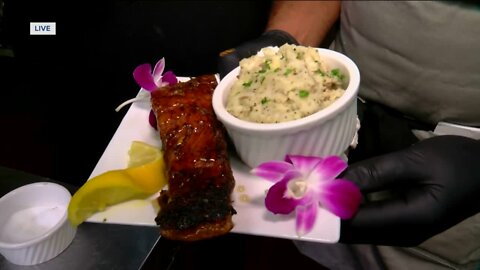 Cooking salmon at Belli's Bistro & Spirits