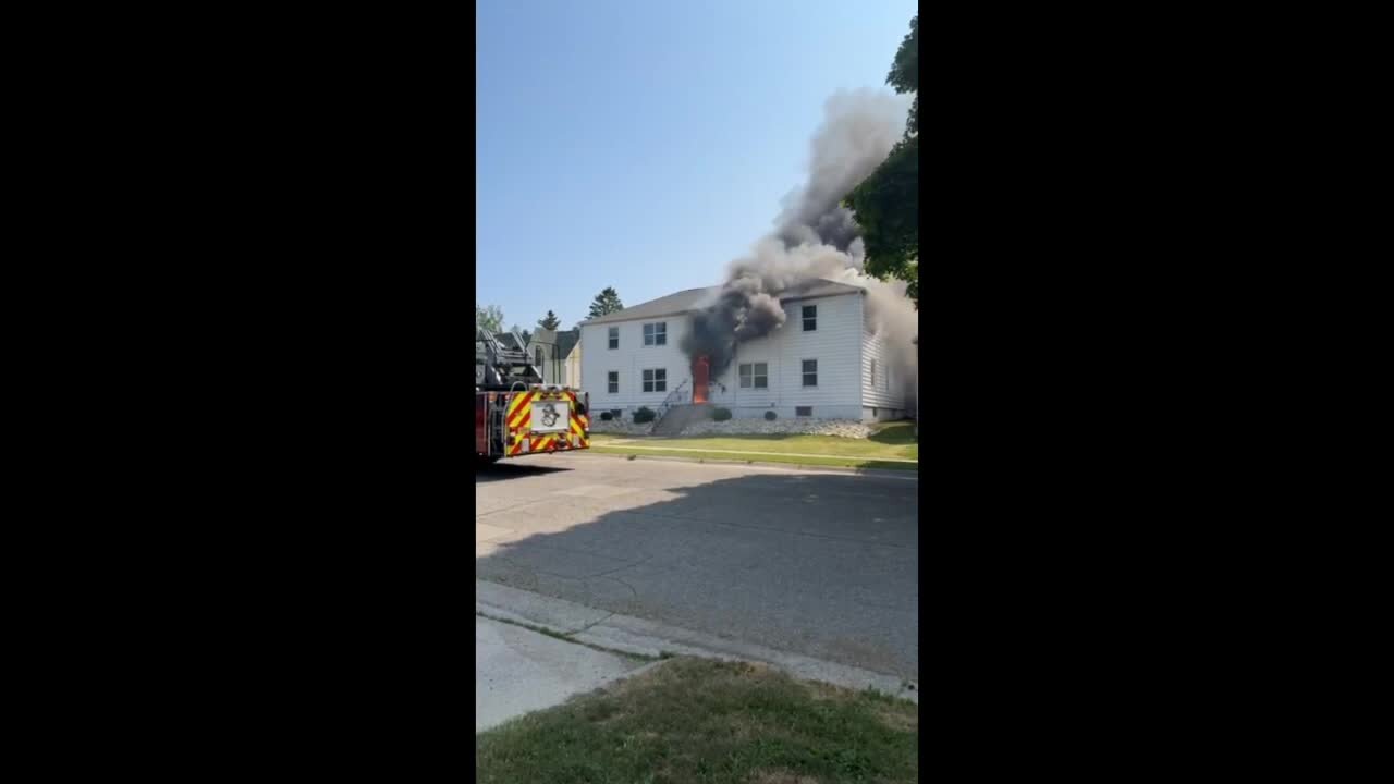 Crews responding to a multi-family building fire in Sturgeon Bay