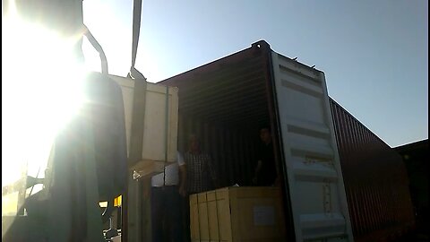 The way we are unloading a heavy box inside of container