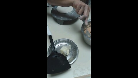 Making stuffed potato bread