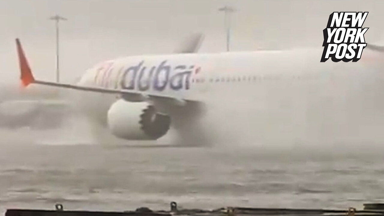 Boeing 737 pushes through biblical flash floods at Dubai Airport