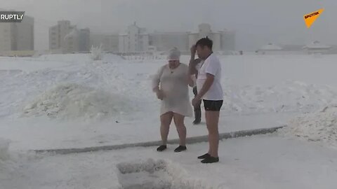 ‘Useful stress for the body’ - Yakutsk locals take ice-cold Epiphany dip