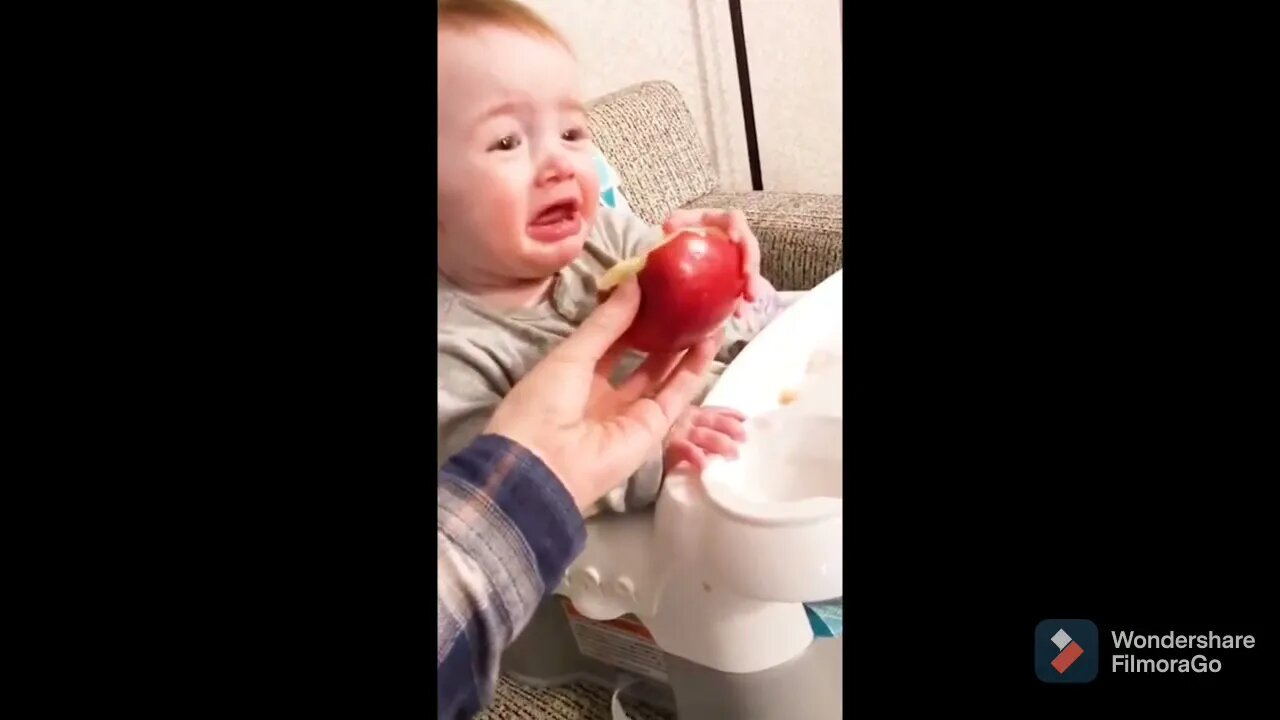 Cute little baby loves his apple...mommy don't touch#baby#love#apple#cry#back#shorts#firstshortvideo