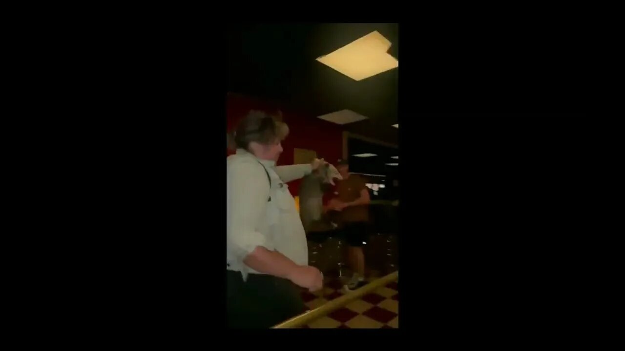 A badass woman from Alaska took charge when a possum strolled into an NYC bar.