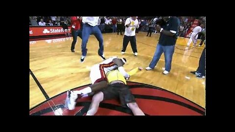 LeBron tackles Heat fan who hits $75,000 shot!