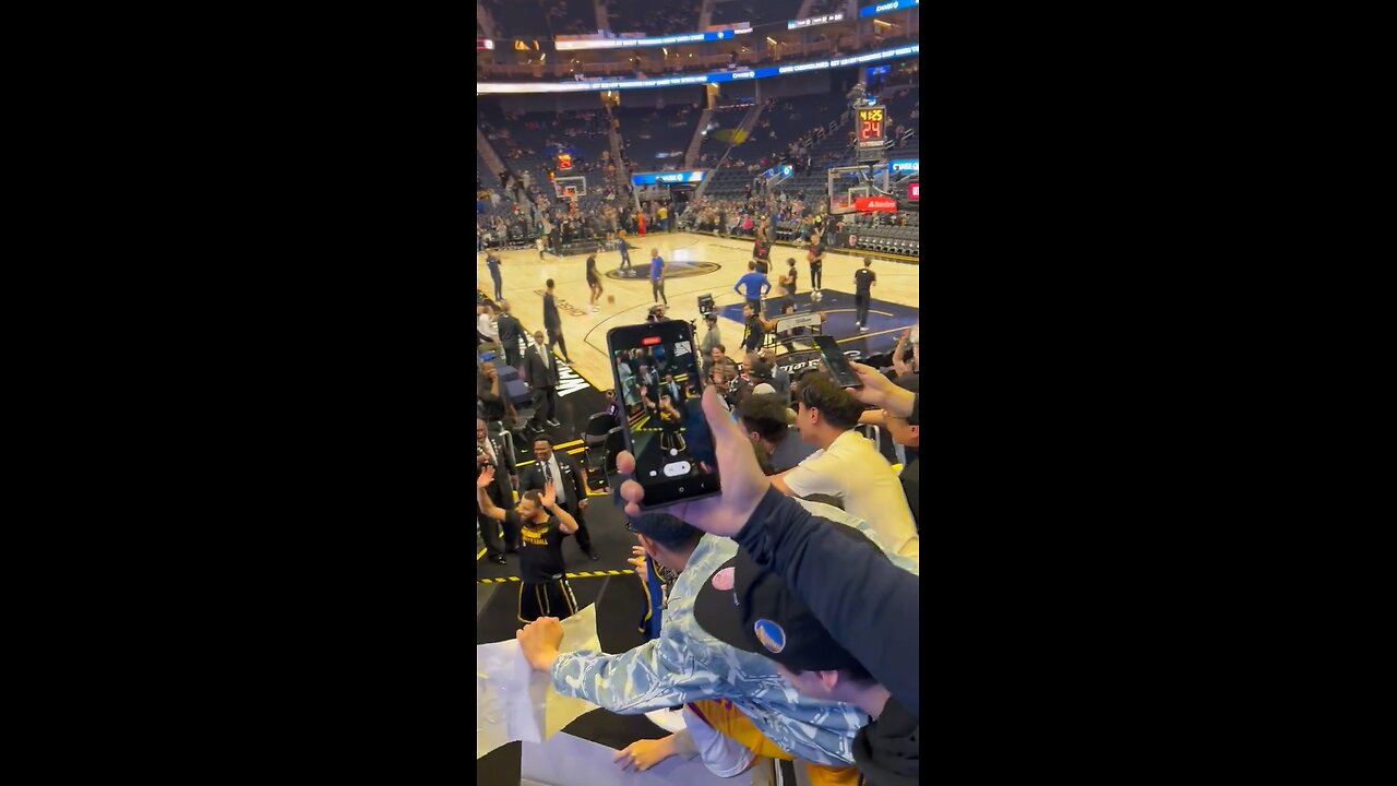 Steph Curry hits a shot from the TUNNEL!!!