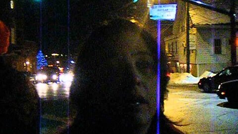 A protestor protests Scott Brown over National Defense authorization act Nashua 12 19 13