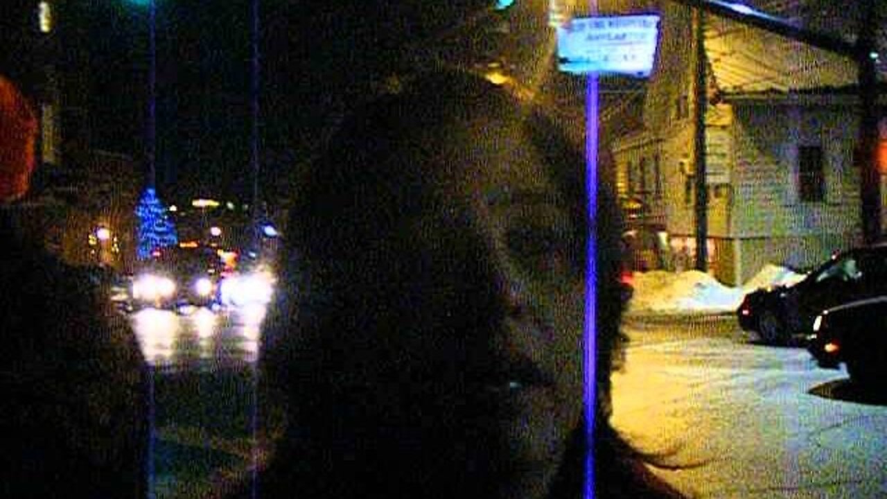 A protestor protests Scott Brown over National Defense authorization act Nashua 12 19 13