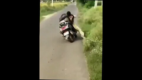 chick gets the bike unstuck then comes unstuck.