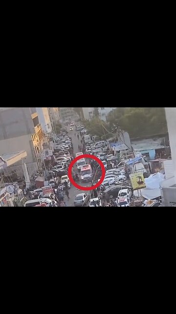 Footage of Israel Targeting An Ambulance Loaded with Injured Civilians