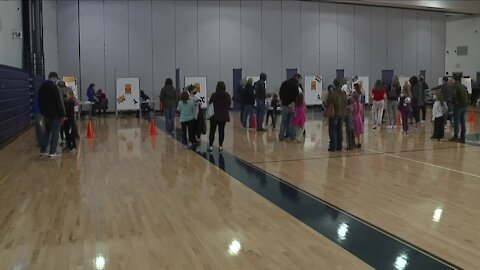 Parents find early holiday cheer at Hudson vaccine clinic for children