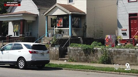 Windows link 'accidental artist' to beloved Covington educator